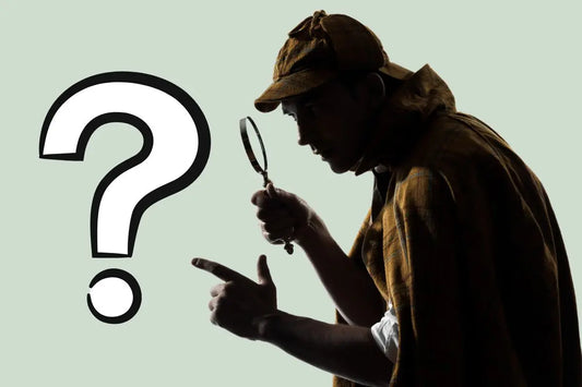 Sherlock Holmes style silhouette with question mark