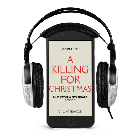 A Killing for Christmas cover on phone with headphones