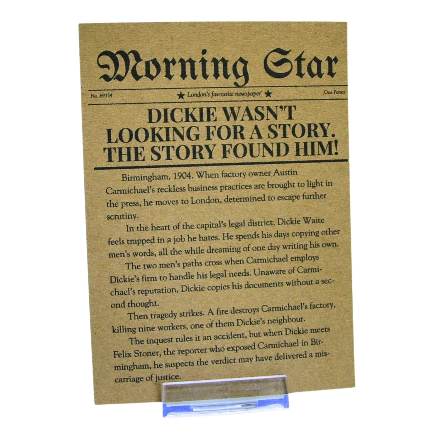 Newspaper-style book cover with text on a stand