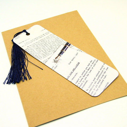 Bookmark with tassel on a brown paper background