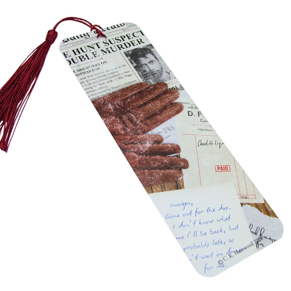 Bookmark with newspaper design and cinnamon rolls, featuring a red tassel.