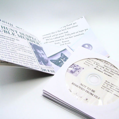 A Killing for Christmas | Paperback, Audio CD and Bookmark Bundle