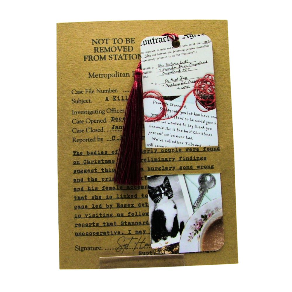 Decorative bookmark with tassel on a textured card with text and images.