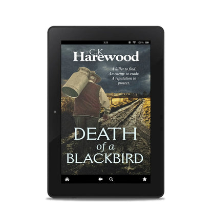 E-reader displaying the book cover of 'Death of a Blackbird' by C.K. Harewood on a white background