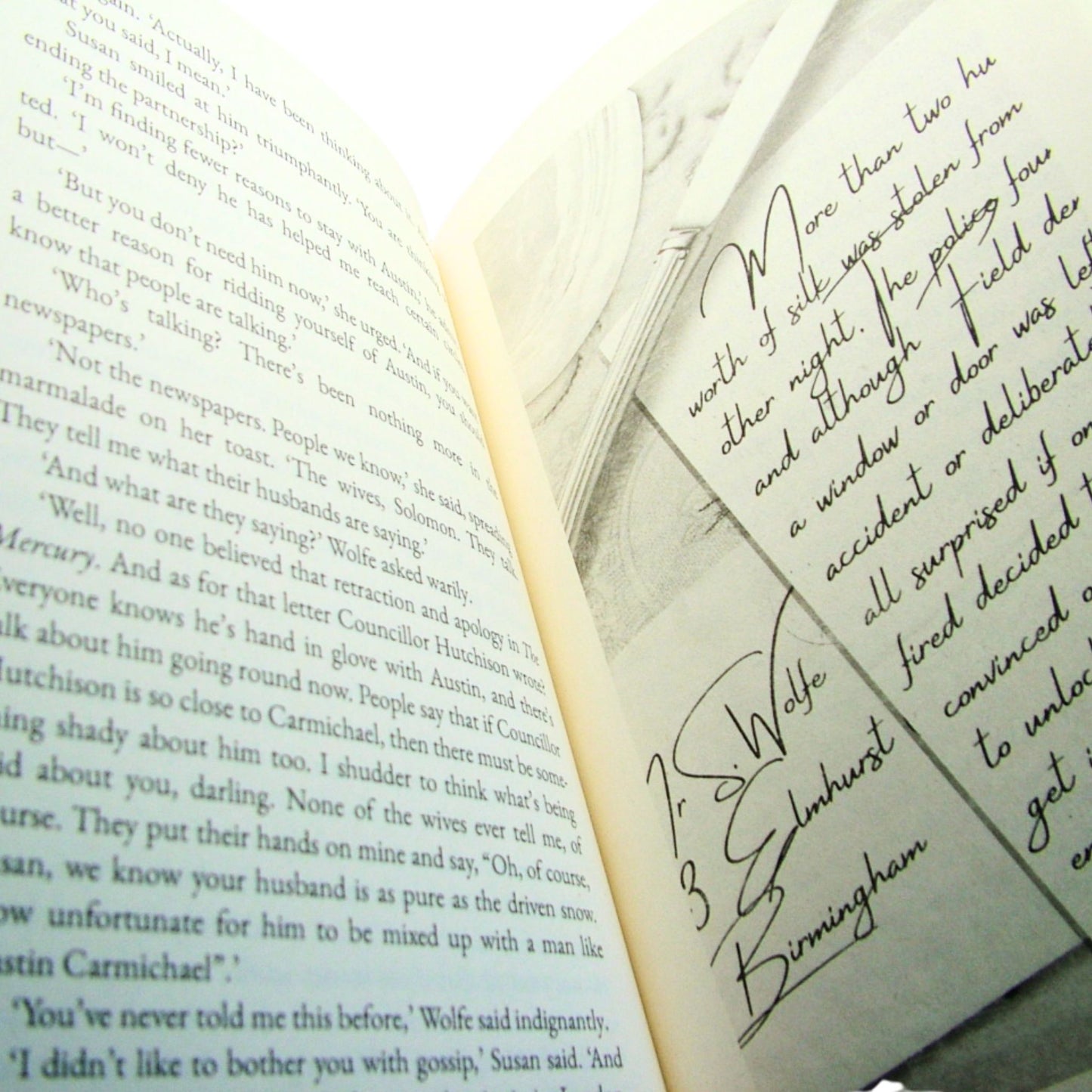Open book with text and graphics