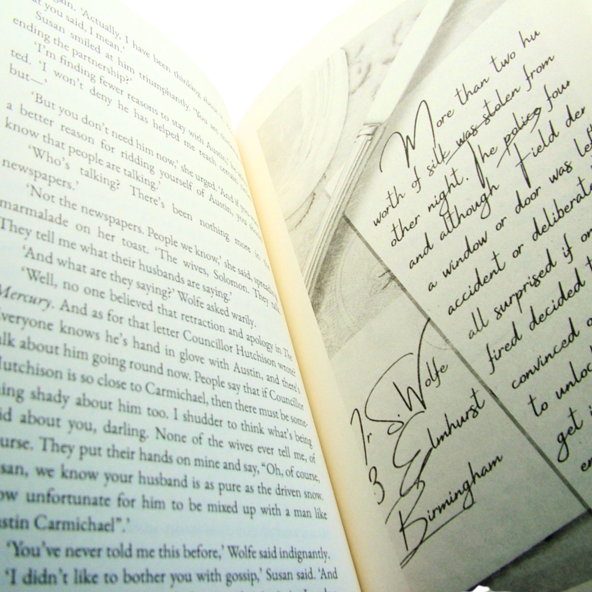 Open book with text and graphics