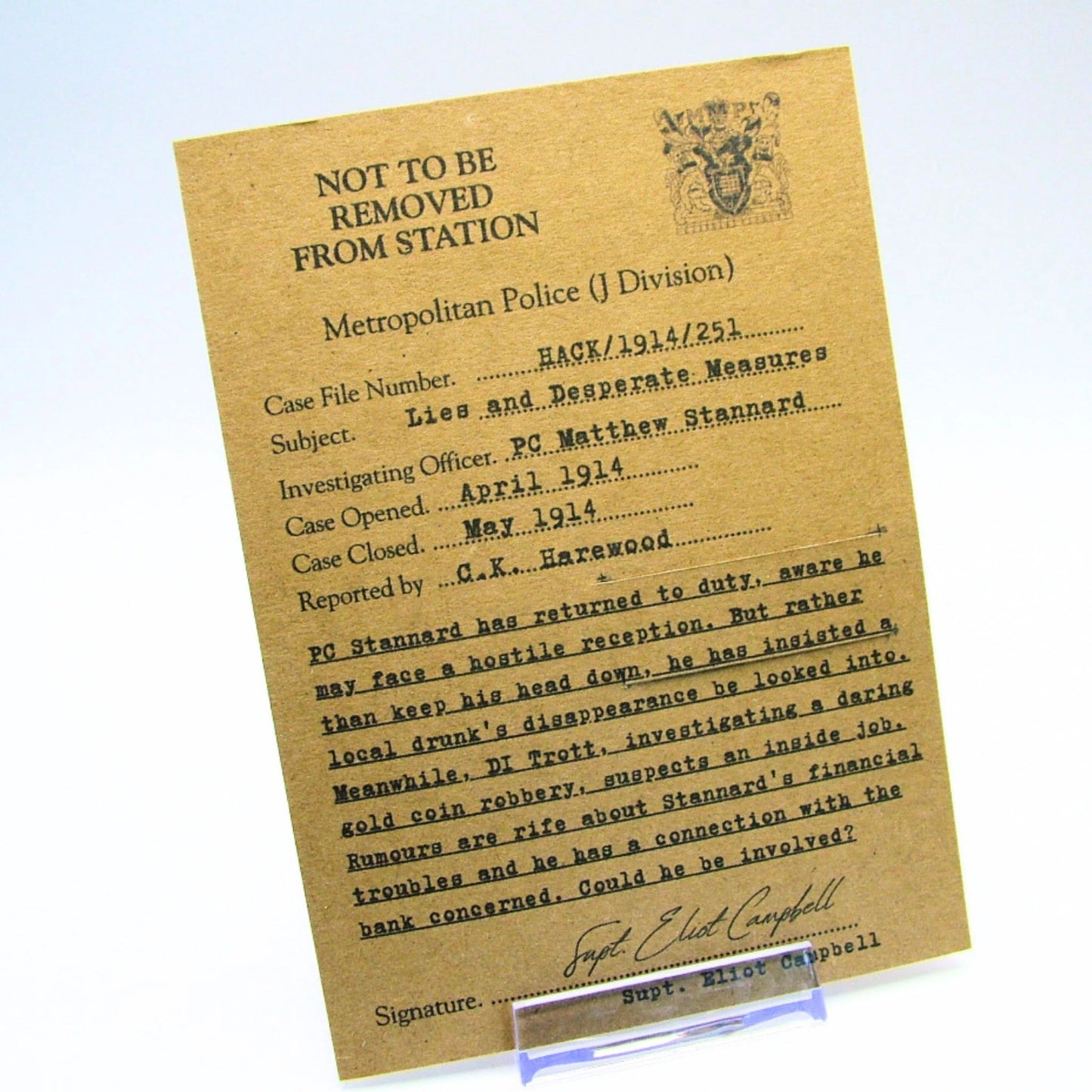 Vintage-looking document with text and a logo on a light blue background