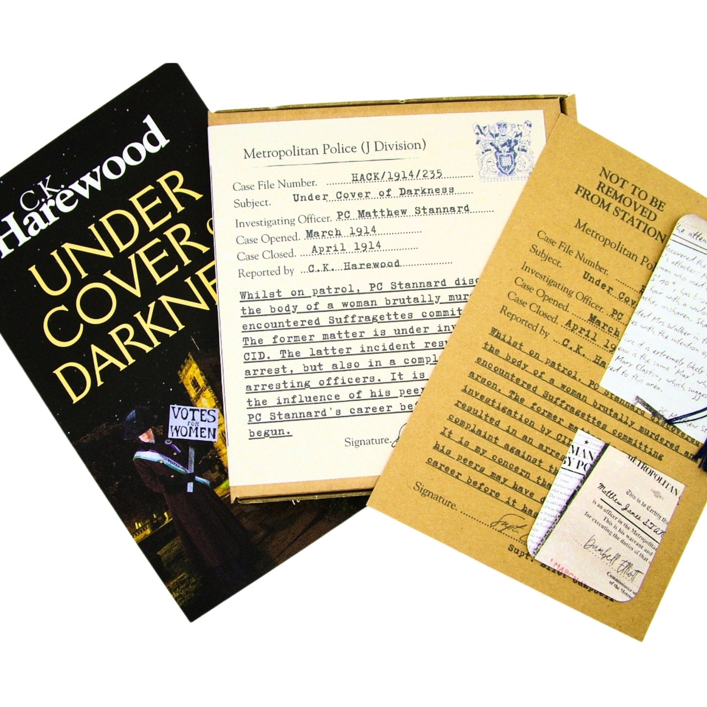 Book titled 'Under Cover in Darkness' by C.K. Harewood with Audio CD Boxset and Bookmark