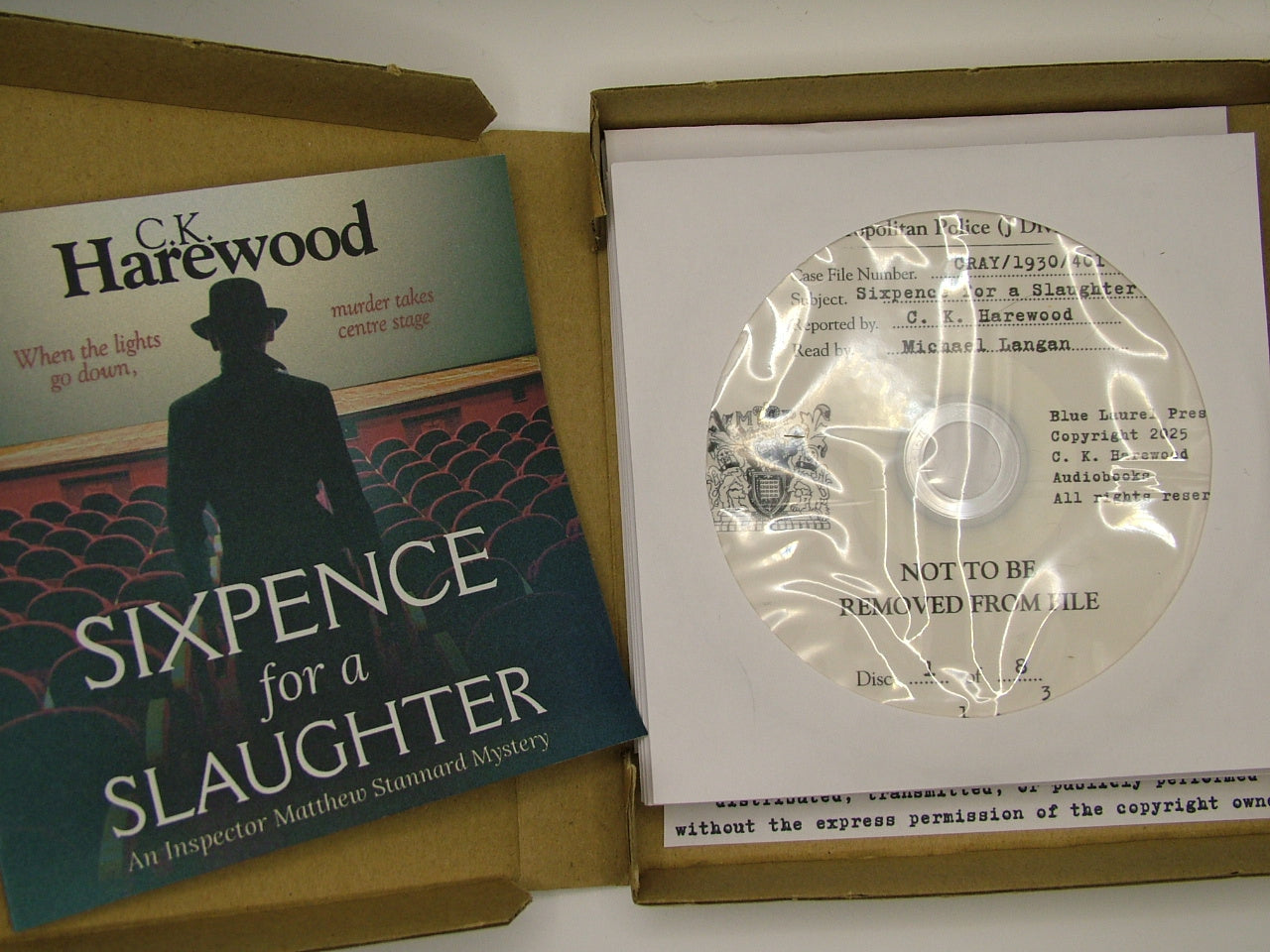 A boxed media package for C.K.