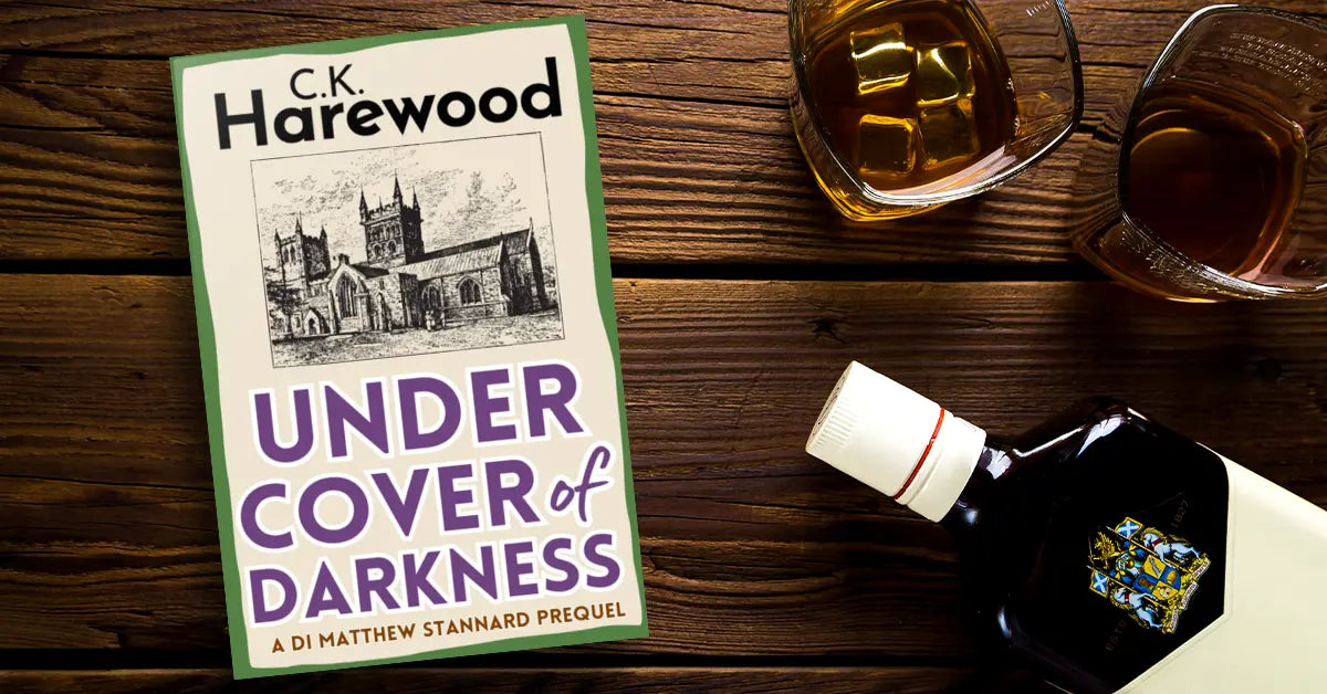 Under Cover of Darkness paperback with whisky and glass